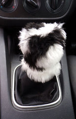 Handmade black and white cow print fuzzy gear knob cover for car interior